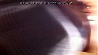 Latina woman showing her pregnant belly and thighs through her skirt