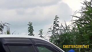 Young Asian amateurs pee outdoors in a spycam video