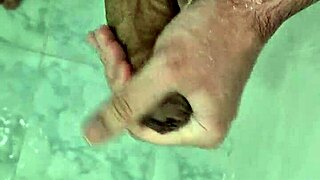 Young and pretty Brazilian amateur in fetish bathroom scene