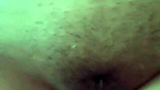 A mature Filipino woman masturbates on webcam while her partner watches