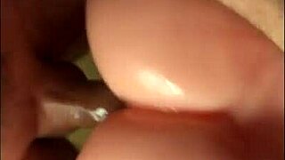 Muscular hunk has his big cock fucked by a sex doll in a cage