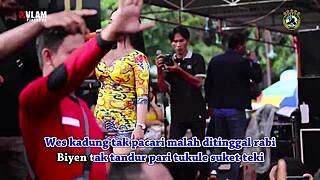 Pretty Indonesian singers dance wild on stage amidst crowd