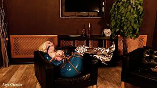 Beautiful MILF in rubber Arya Grander in bondage and domination scenes