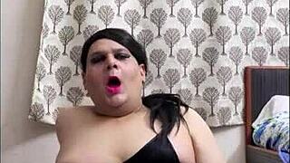 Shemale Monica's solo scene in fishnets and stockings