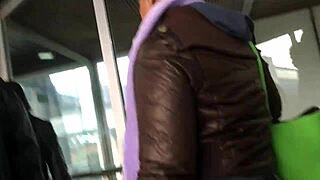 Street hidden camera captures a puffy nylon jacket wearing girl in action