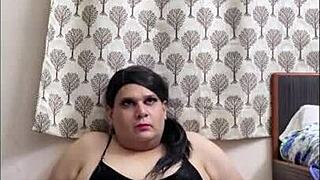 Shemale Monica's solo scene in fishnets and stockings