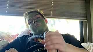 Skinny blonde guy masturbates while doing skin care routine