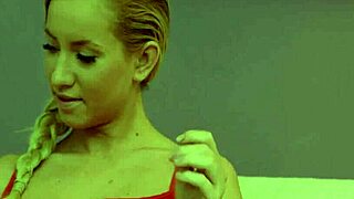 A sexy woman pleases herself with a sex toy