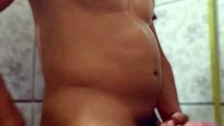 Steamy bathroom scene of one on the gay fetish solo masturbation