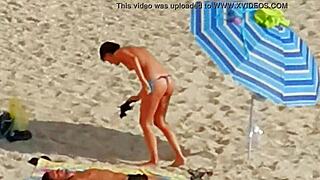 Topless European beauty at the sea in spy action