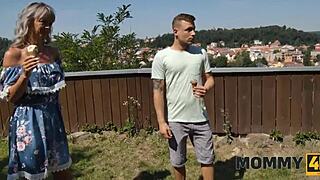 A blonde gay man’s seduction of his mother-in-law in a European setting