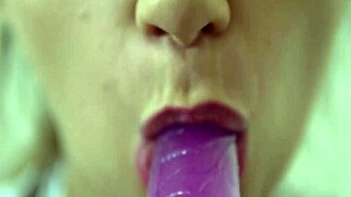 Close up of a teen amateur sucking a dildo