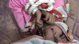 Adriana, a Muslim ladyboy from Thailand, in a BDSM scene with a mouth job