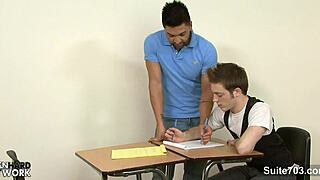 Gay porn stars in hardcore classroom scene with a tattooed stud