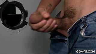 Gay gloryhole action in the restroom