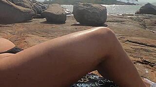 Gay couple enjoys public sex on the beach in Brazil