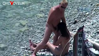 Public beach encounter between a voyeur and a wife who reveals her body and has oral and vaginal sex