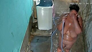 Stepmother takes a shower and shows off her big tits
