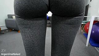 Skinny sporty babe shows off her big ass outside