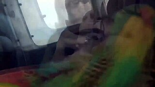 A young woman has fun in her car