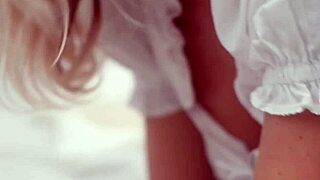 Blonde bombshell undresses to nothing in softcore tease