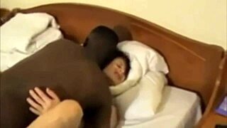 A white man films his wife being penetrated by a black man and then having sex with him