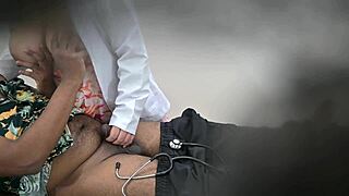 Beautiful woman in white coat enjoys her work with a handsome man