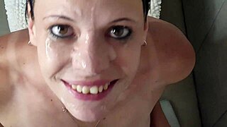 A foolish woman receives a urine and semen facial while performing oral sex