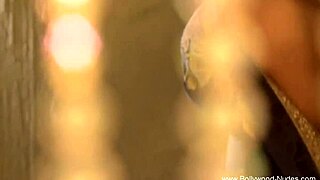 Asian beauty dances seductively under soft lighting