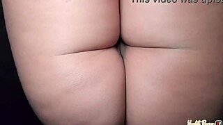 Horny Latina sucks cock through gloryhole and swallows cum