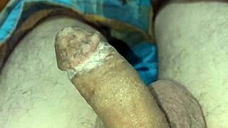 Oiled-up cock gets some attention