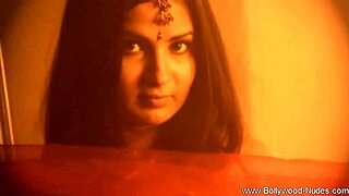 A beautiful Indian MILF slowly undresses and reveals her beauty