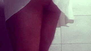 A skirt wearing ladyboy pleasuring herself