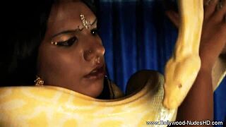Seductive Indian beauty dances and pleases in bedroom